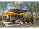 Relaxing community patio with umbrellas, seating, and a bar at 18203 E Paria Canyon Dr, Rio Verde, AZ 85263