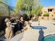 Relaxing waterfall feature next to the community pool and spa at 13600 N Fountain Hills Blvd # 504, Fountain Hills, AZ 85268