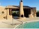 Community outdoor fireplace with covered seating area at 13600 N Fountain Hills Blvd # 504, Fountain Hills, AZ 85268