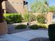 Landscaped front yard with gravel, flowers, and shrubs at 13600 N Fountain Hills Blvd # 504, Fountain Hills, AZ 85268