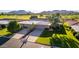 Aerial view of property showcasing its location within a golf course community at 7428 N Tombstone Rd, Scottsdale, AZ 85258