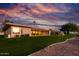 Back exterior of the house showcasing a large backyard at 7428 N Tombstone Rd, Scottsdale, AZ 85258