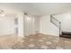 Dining area with tile floors and adjacent kitchen at 6730 W Monterosa St, Phoenix, AZ 85033