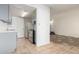 Galley kitchen with gray cabinets and stainless steel appliances at 6730 W Monterosa St, Phoenix, AZ 85033