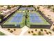 Four well-maintained tennis courts at 34 N Agua Fria Ln, Casa Grande, AZ 85194