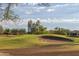 Picturesque golf course with manicured greens and sand traps at 126 S Lucia Ln, Casa Grande, AZ 85194