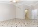 Spacious bedroom with tile floors and access to a private bathroom at 126 S Lucia Ln, Casa Grande, AZ 85194