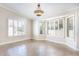 Bright dining room with bay window and tile floors at 126 S Lucia Ln, Casa Grande, AZ 85194