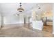 Open kitchen with granite countertops and stainless steel appliances at 126 S Lucia Ln, Casa Grande, AZ 85194