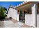 Side yard with walkway and decorative gate at 126 S Lucia Ln, Casa Grande, AZ 85194