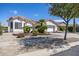 Single story home with two car garage and desert landscaping at 126 S Lucia Ln, Casa Grande, AZ 85194