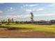 Golf course with homes in the background at 126 S Lucia Ln, Casa Grande, AZ 85194