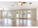 Spacious living room featuring tile floors and a view to the backyard at 126 S Lucia Ln, Casa Grande, AZ 85194