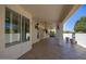 Covered patio with tile flooring, ceiling fan and lighting at 126 S Lucia Ln, Casa Grande, AZ 85194