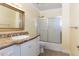 Bathroom with single vanity and shower/tub combo at 126 S Lucia Ln, Casa Grande, AZ 85194