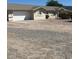 Ranch-style home with a gravel yard at 8190 N Bel Air Rd, Casa Grande, AZ 85194