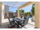 Outdoor patio with seating area, adjacent to pool and storage shed at 4771 E Meadow Land Dr, San Tan Valley, AZ 85140