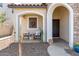 Inviting front porch decorated for autumn at 4771 E Meadow Land Dr, San Tan Valley, AZ 85140