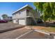Two-story building with attached garages and guest parking at 2633 W Ocotillo Rd # 3, Phoenix, AZ 85017