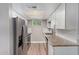 Modern kitchen with stainless steel appliances and white cabinets at 2633 W Ocotillo Rd # 3, Phoenix, AZ 85017