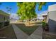 Community features a grassy lawn, walkways, and a swimming pool at 2633 W Ocotillo Rd # 3, Phoenix, AZ 85017