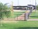 Well-maintained baseball field with dugouts at 42023 N Bridlewood Way, Phoenix, AZ 85086