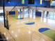 Indoor basketball court with markings and hoops at 42023 N Bridlewood Way, Phoenix, AZ 85086