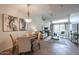 Elegant dining area with a charming table and four chairs, adjacent to the living room at 9065 E Gary Rd # 147, Scottsdale, AZ 85260