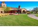 Community clubhouse with outdoor seating and fire pit at 2229 N Beverly Pl, Buckeye, AZ 85396