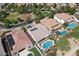 Aerial view of neighborhood with pools and park at 2229 N Beverly Pl, Buckeye, AZ 85396
