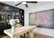 Spacious home office with large art piece and built-in shelving at 8320 E Appaloosa Trl, Scottsdale, AZ 85258