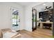 Home office with built-in shelving and plenty of natural light at 8320 E Appaloosa Trl, Scottsdale, AZ 85258