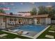 Luxury backyard oasis featuring a sparkling pool and lounge chairs at 8320 E Appaloosa Trl, Scottsdale, AZ 85258