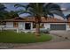 Single story home with a renovated exterior and landscaped yard at 8320 E Appaloosa Trl, Scottsdale, AZ 85258
