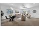 Open living and dining area with patio access at 16308 E Arrow Dr # 111, Fountain Hills, AZ 85268