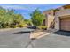 Condo building with attached garage and landscaping at 16308 E Arrow Dr # 111, Fountain Hills, AZ 85268