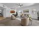 Bright living room with comfy seating and a dining area at 16308 E Arrow Dr # 111, Fountain Hills, AZ 85268