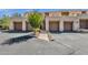 Condo building with attached garages and landscaping at 16308 E Arrow Dr # 111, Fountain Hills, AZ 85268