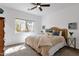 Spacious bedroom with a king-size bed and window at 16308 E Arrow Dr # 111, Fountain Hills, AZ 85268