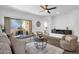 Living room with comfortable seating and access to patio at 16308 E Arrow Dr # 111, Fountain Hills, AZ 85268