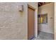 Exterior view of condo building entrance and landscaping at 16308 E Arrow Dr # 111, Fountain Hills, AZ 85268