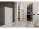 Convenient laundry room with ample storage shelving and modern finishes at 14828 N 15Th Ave, Phoenix, AZ 85023