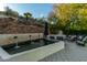 Tranquil water feature with seating and landscaping at 14828 N 15Th Ave, Phoenix, AZ 85023