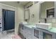 Modern bathroom with double vanity and a shower/tub combo at 14828 N 15Th Ave, Phoenix, AZ 85023