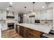 Spacious kitchen with a large island and modern cabinetry at 14828 N 15Th Ave, Phoenix, AZ 85023