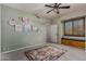 Bright bedroom with window seat and decorative wall art at 14828 N 15Th Ave, Phoenix, AZ 85023