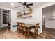 Charming built-in dining nook with a rustic wooden table and bench seating at 14828 N 15Th Ave, Phoenix, AZ 85023
