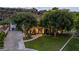 Luxury home with a spacious yard, driveway, and beautiful landscaping at 14828 N 15Th Ave, Phoenix, AZ 85023