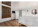 Cozy bedroom with a double bed, dresser, and large windows with plantation shutters at 14828 N 15Th Ave, Phoenix, AZ 85023