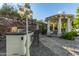 Outdoor kitchen with bar seating and built-in grill at 14828 N 15Th Ave, Phoenix, AZ 85023
